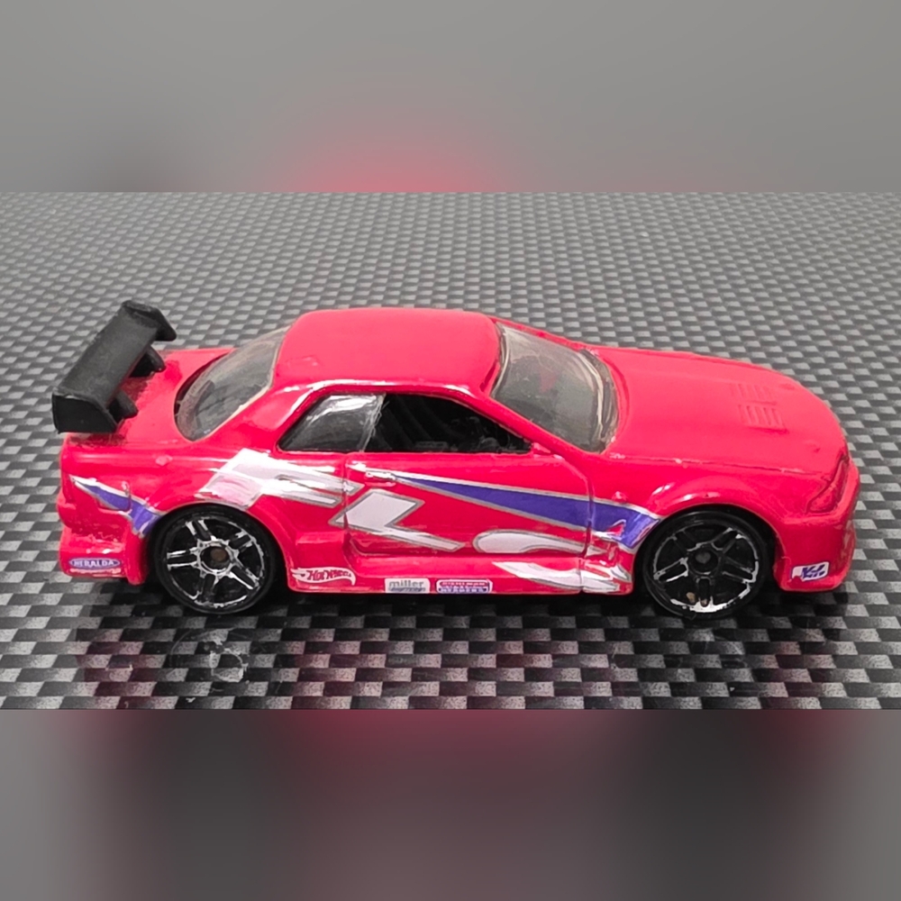 Sleek Red Toy Car with Black Accents